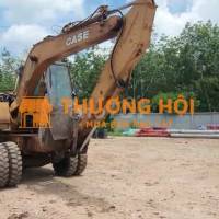 Máy đào bánh lốp CASE, màu vàng