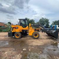 xe xúc lật cần dài đổ cao 4m5