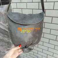 Giỏ đeo chéo da thật kiểu dáng độc lạ, mới cao.