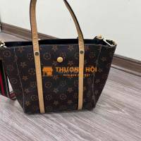 Túi da tặng kèm túi vải