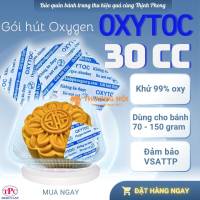 Gói chống mốc OXYTOC đang bảo vệ điều gì bên trong hộp bánh trung thu?