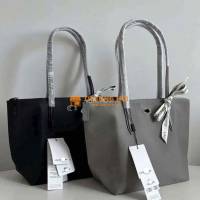 Pass túi Lacoste màu đen mới