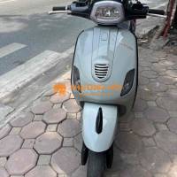 Xe điện Vespa Espero màu xám xi măng biển hà nội