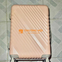 Vali kéo nhựa PC 4 bánh, màu hồng pastel xước nhẹ
