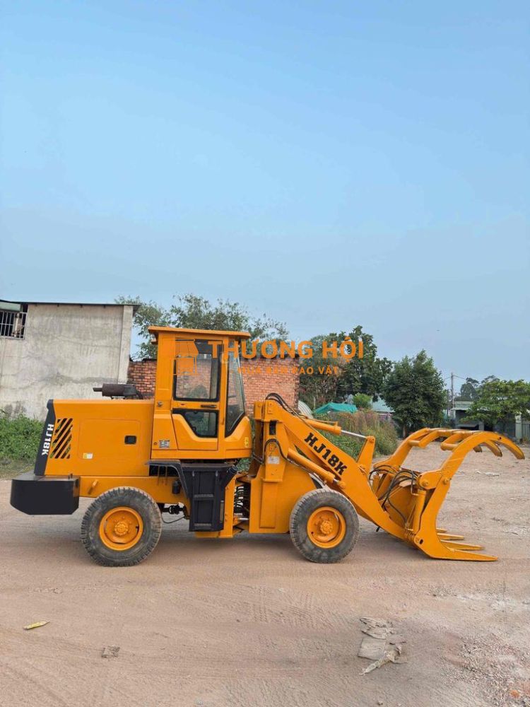 xe xúc lật gắp kẹp giá vài chuck