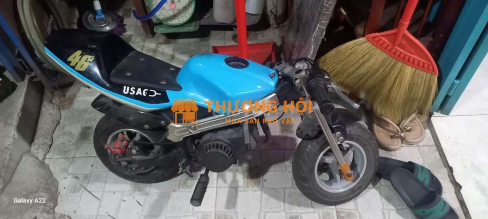 Xe mô tô máy cắt cỏ