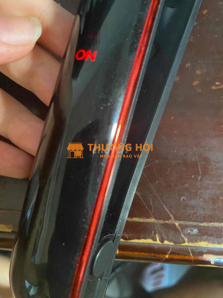 máy duỗi uốn tóc màu đen bóng mới