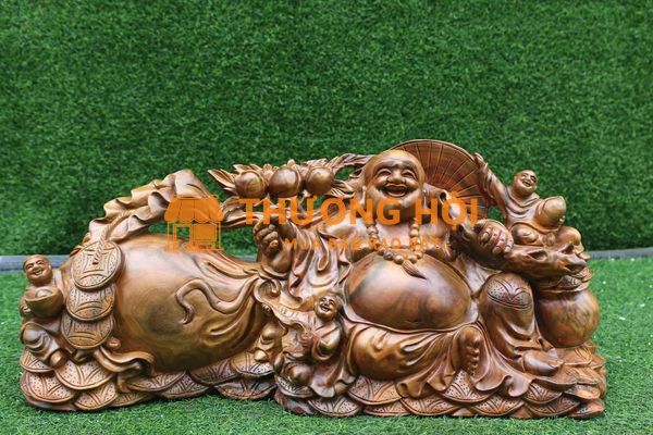 Tượng Di Lặc kéo bao tiền – Biểu tượng tài lộc