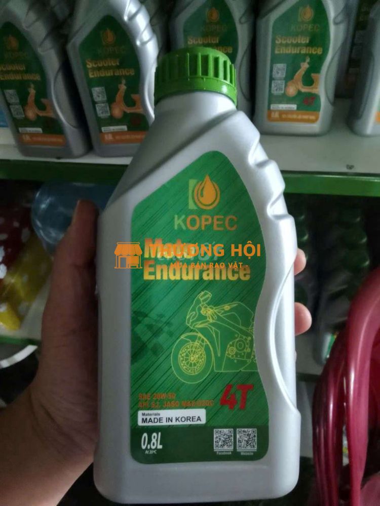 Com bồ 2 chai nhớt xe máy và xe tay ga