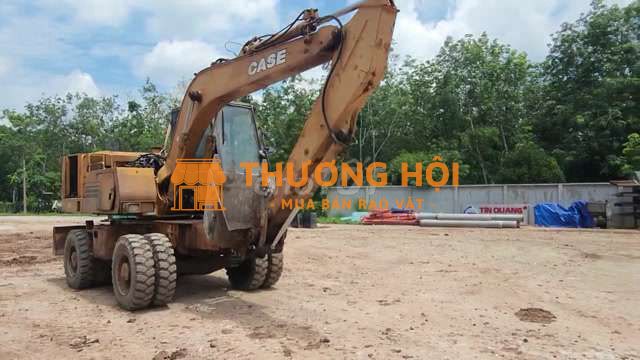 Máy đào bánh lốp CASE, màu vàng