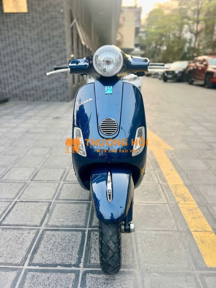 Vespa LX 125ie 2011 màu xanh biển HN sơn zin