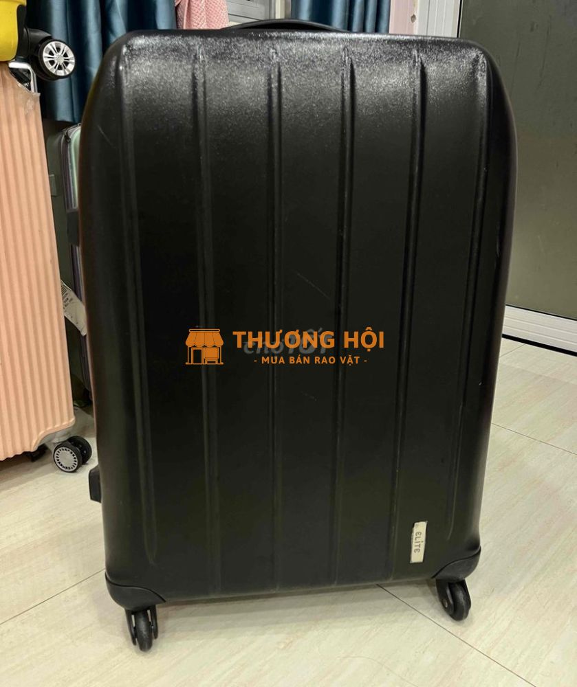 vali elite loại 23kg màu đen ko xài nữa nên pass
