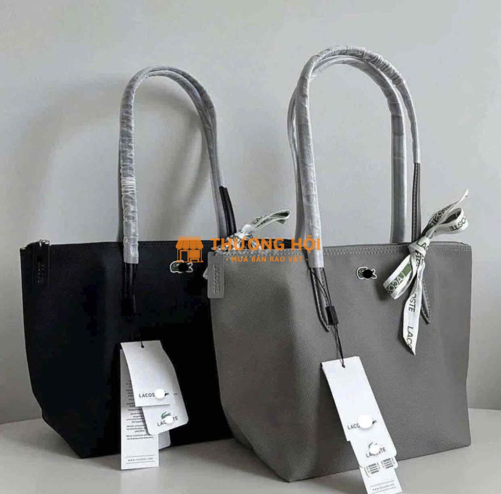 Pass túi Lacoste màu đen mới
