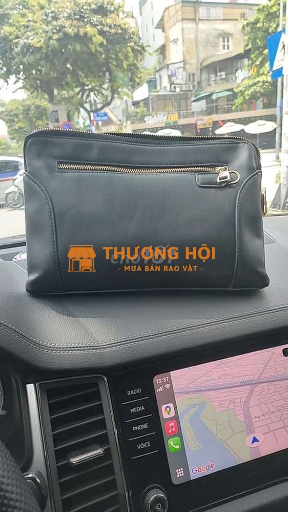 Túi xách da đen cầm tay nam, 90% mới