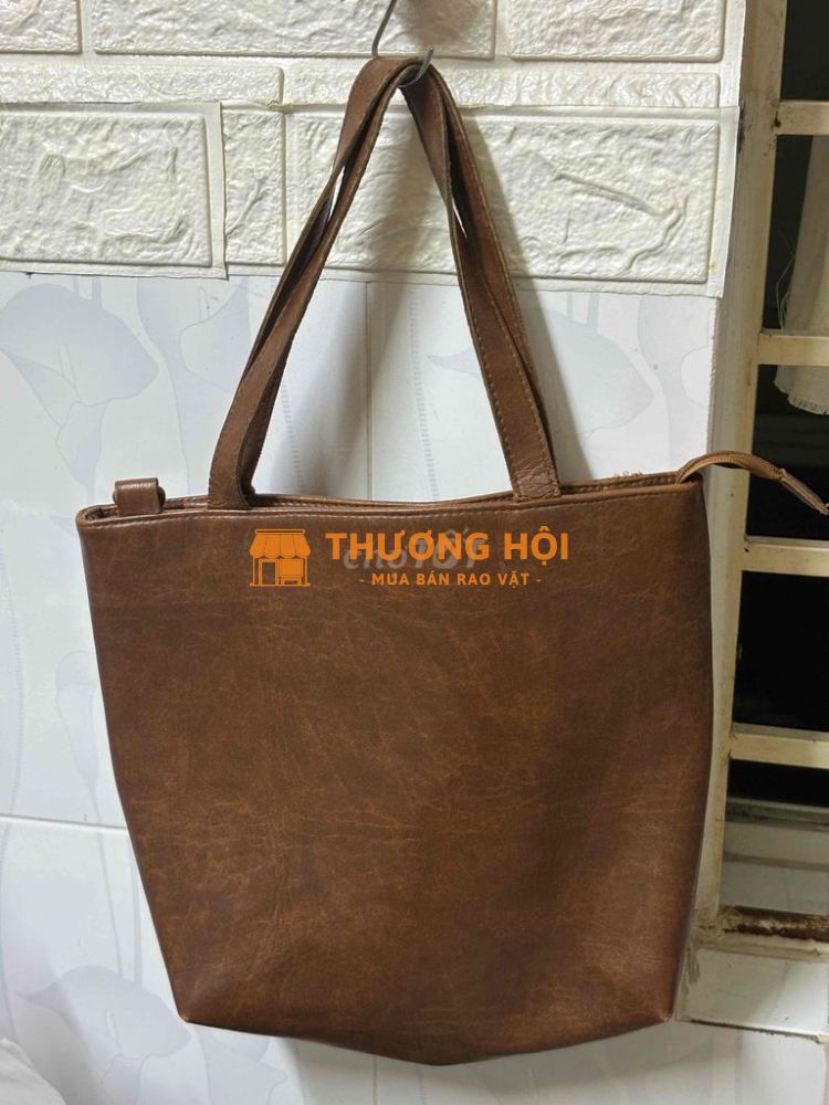 Thanh lý pass Túi da màu nâu có dây kéo