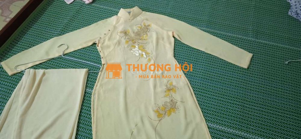 Áo dài Mỹ Vinh màu vàng mơ hoa văn vàng