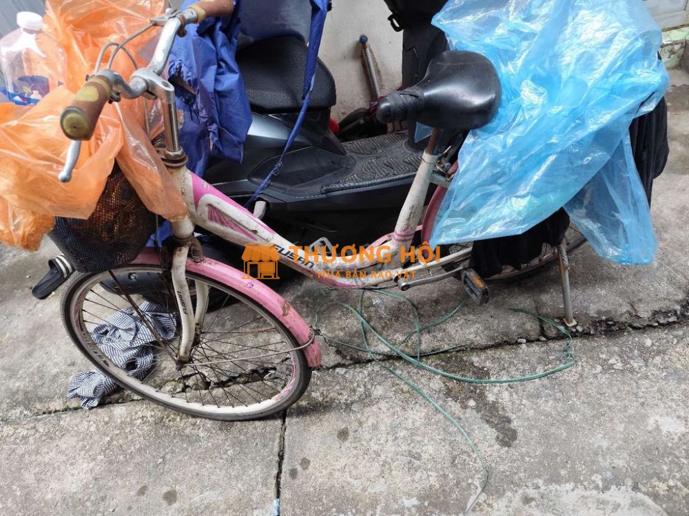 Bán xe đạp cũ vừa bán vừa cho